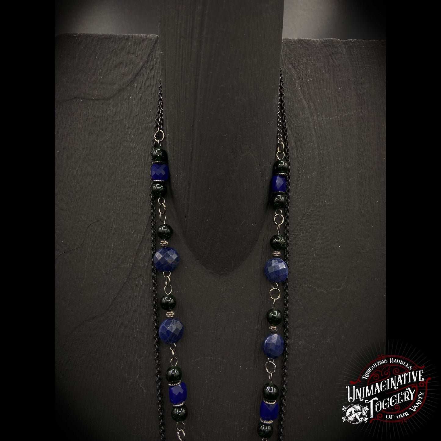 Sapphire Beetle - Unimaginative By Charli Siebert