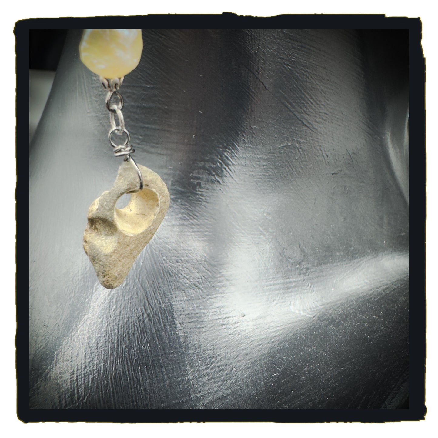 Pearl and Hag Stone eyewear chain