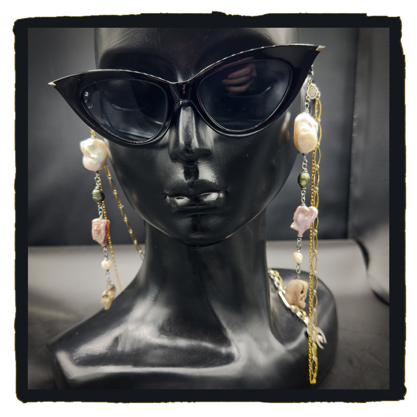 Pearl and Hag Stone eyewear chain