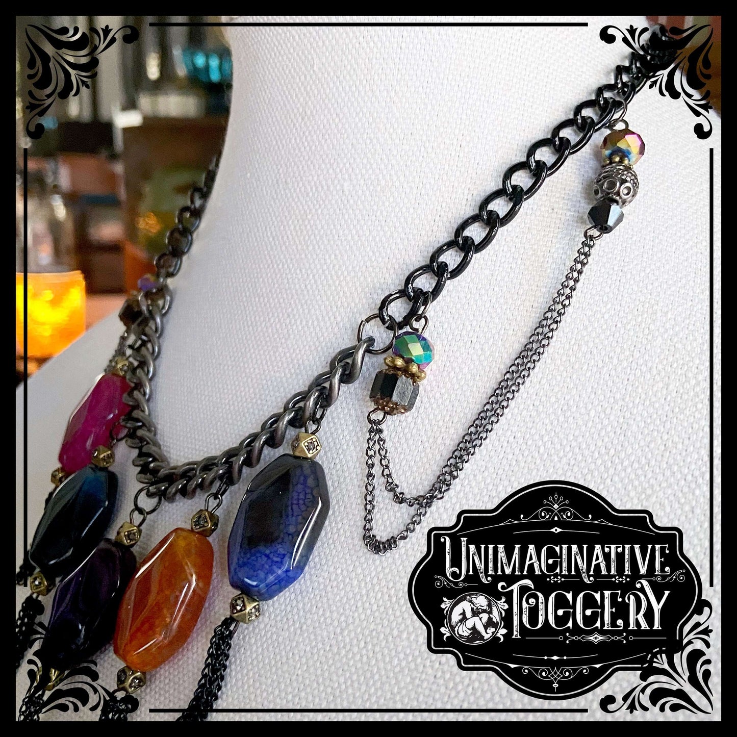 Jewel tone stone beads and black tassels gunmetal chain necklace - Unimaginative By Charli Siebert
